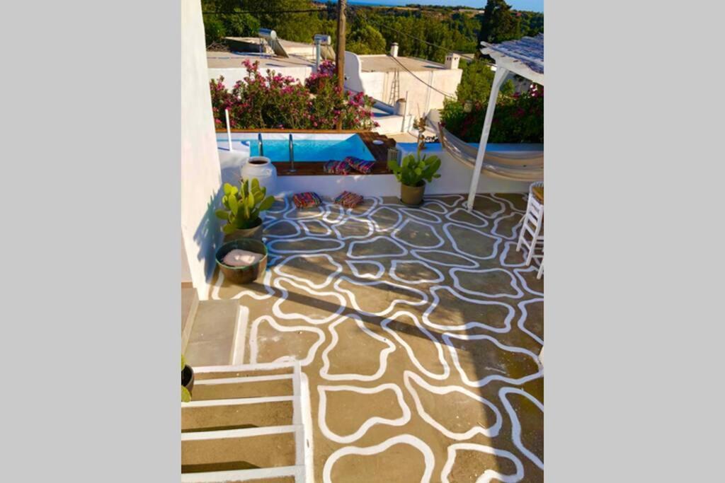 The Summer Pink House Lakhania Bagian luar foto